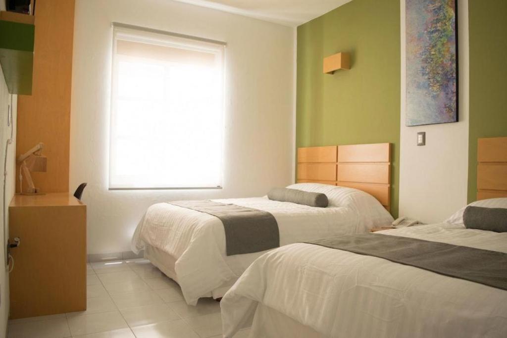 Hotel Barante Suites Salamanca Bagian luar foto